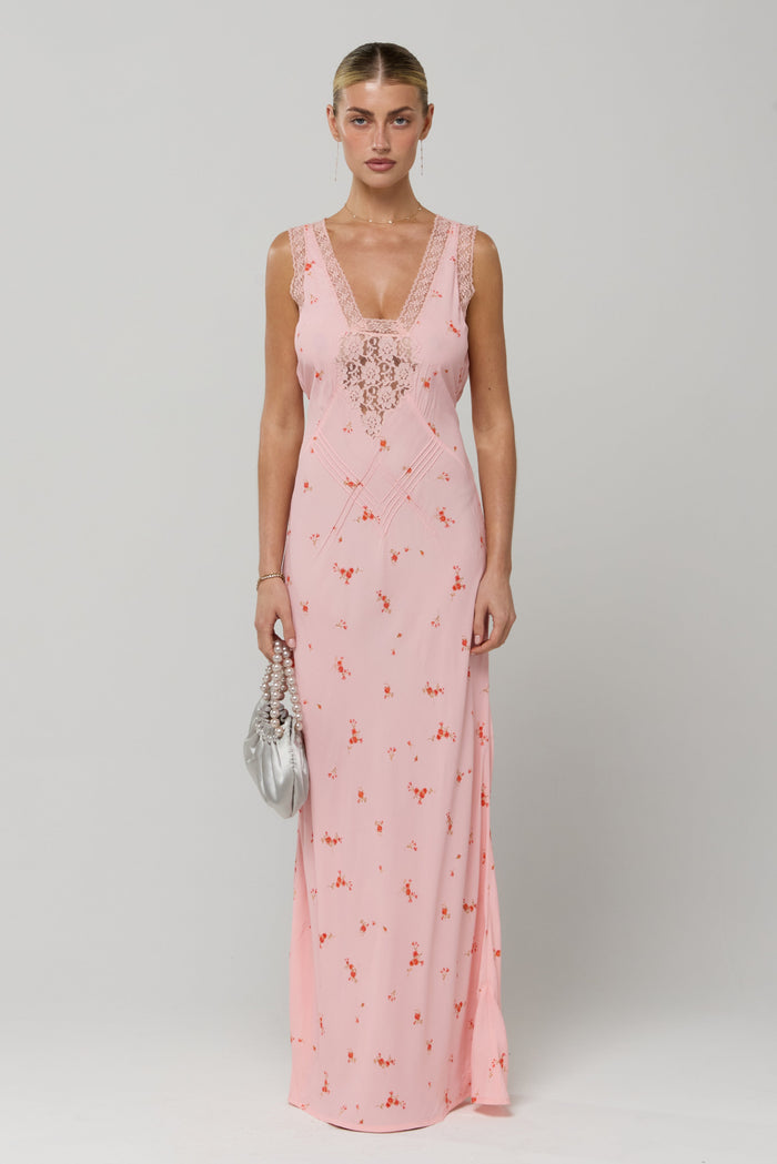 This is an image of Aimee Dress in Sweet Pea - RESA featuring a model wearing the dress