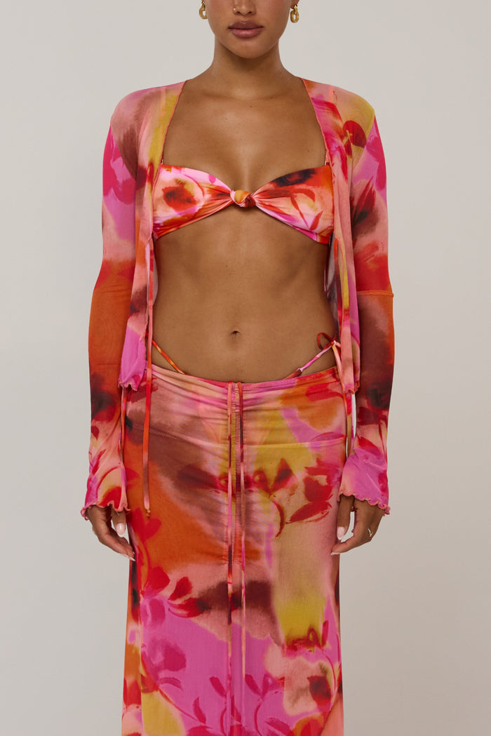 This is an image of Aliyah in Lilikoi - RESA featuring a model wearing the dress