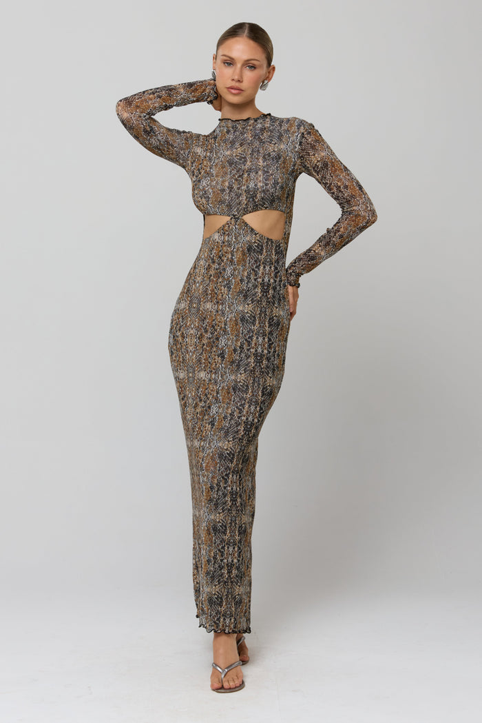 This is an image of Audrey Dress in Serpent - RESA featuring a model wearing the dress
