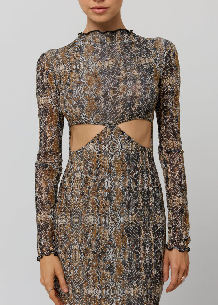 This is an image of Audrey Dress in Serpent - RESA featuring a model wearing the dress