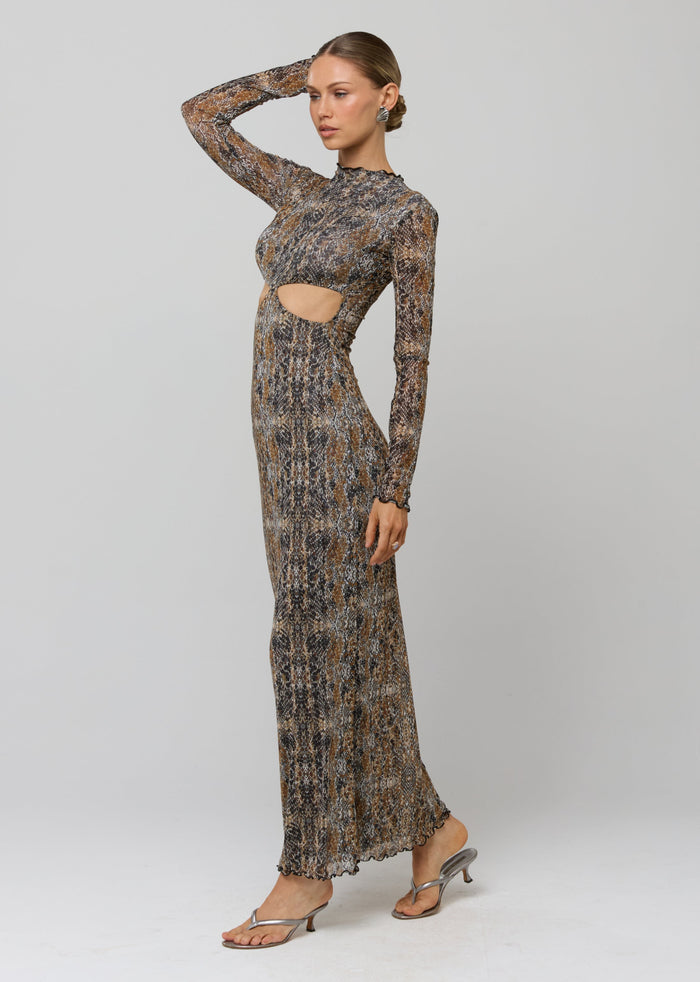 This is an image of Audrey Dress in Serpent - RESA featuring a model wearing the dress