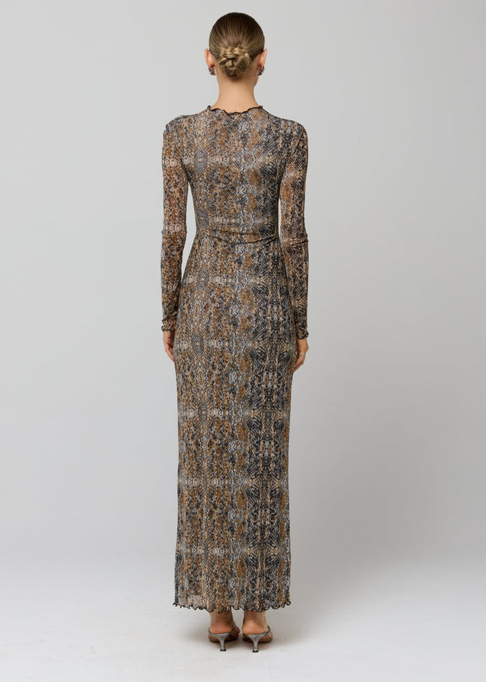 This is an image of Audrey Dress in Serpent - RESA featuring a model wearing the dress