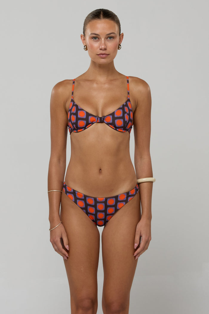 This is an image of Beau Bikini Bottom in Mod - RESA featuring a model wearing the dress