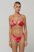 This is an image of Beau Bikini Bottom in Rosebud - RESA featuring a model wearing the dress