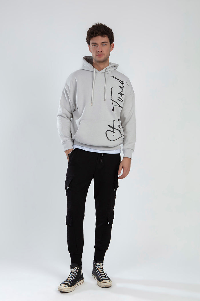 Men's Benjamin slim-fit black cargo pants with utility pockets and joggers cuffs for an urban streetwear look.