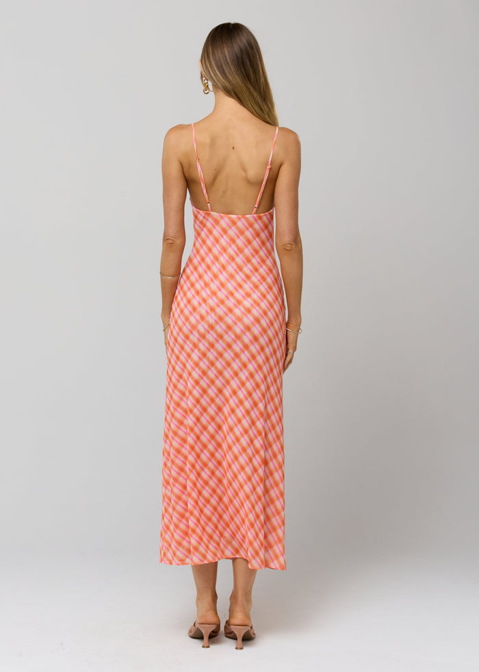 This is an image of Berri Midi Dress in Sorbet - RESA featuring a model wearing the dress