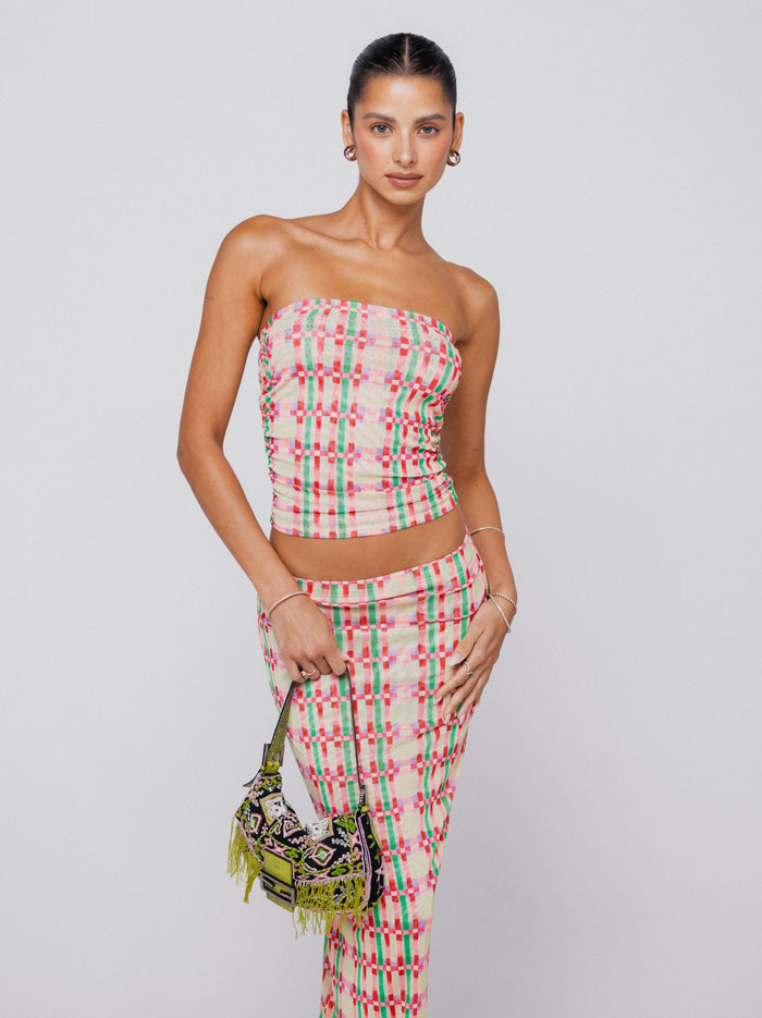 This is an image of Bonnie Mesh Top in Plaid - RESA featuring a model wearing the dress