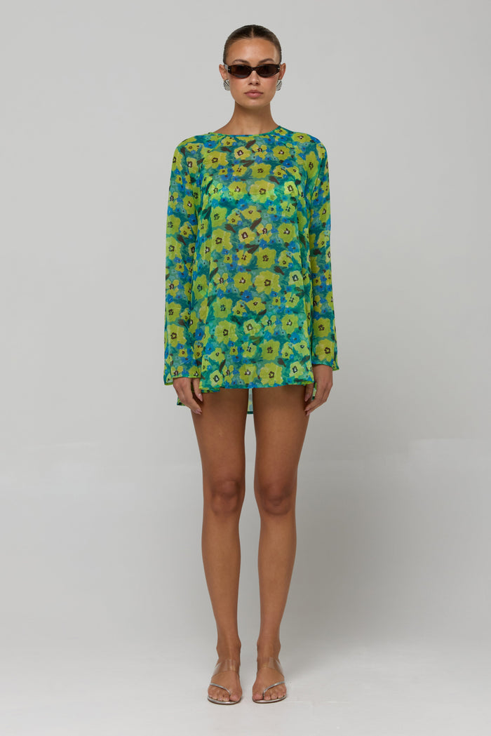 This is an image of Bre Dress in Blue Crush - RESA featuring a model wearing the dress