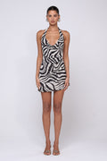 This is an image of Bruna Dress in Tigris - RESA featuring a model wearing the dress