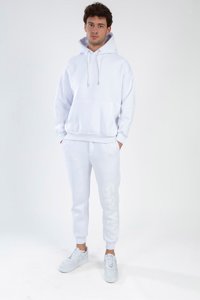 White Chaos oversized streetwear set with a pullover hoodie and matching jogger pants for a trendy two-piece look.