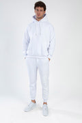 White Chaos oversized streetwear set with a pullover hoodie and matching jogger pants for a trendy two-piece look.