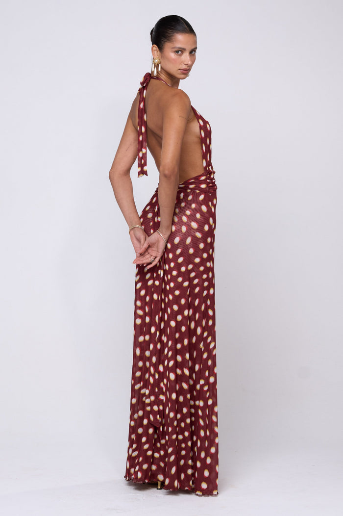 This is an image of Chelsea Maxi Dress in Spice - RESA featuring a model wearing the dress