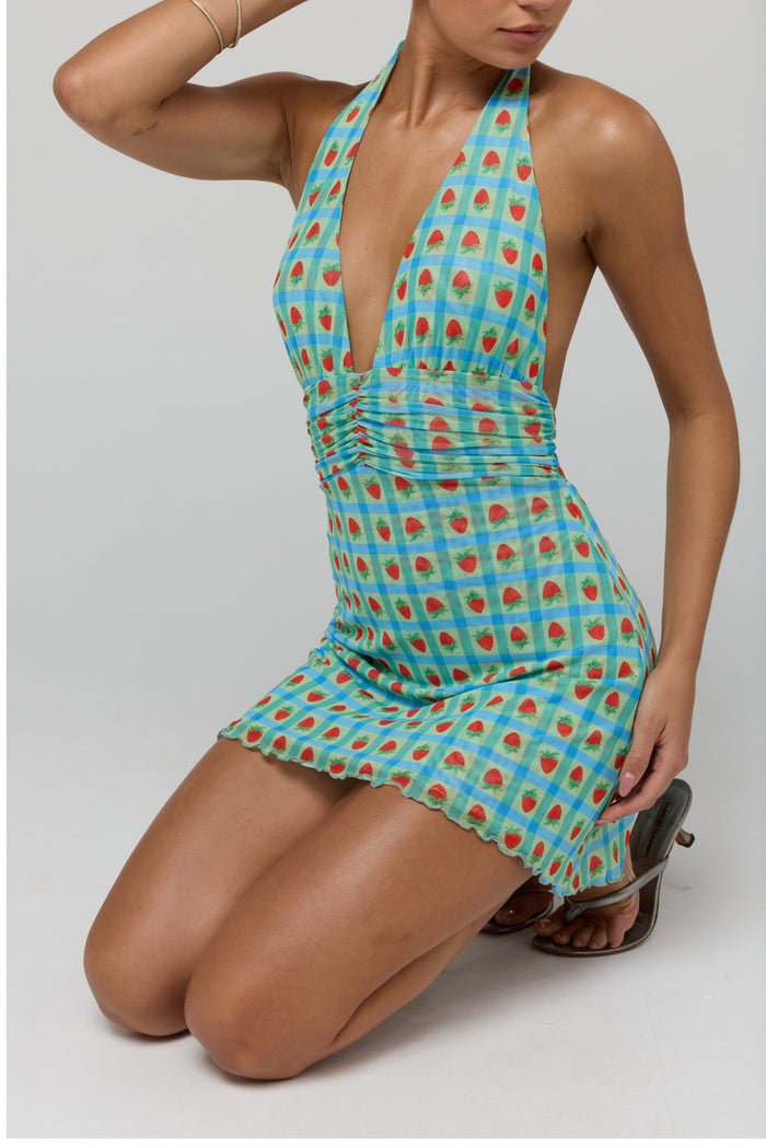 This is an image of Clint Dress in Juicy - RESA featuring a model wearing the dress