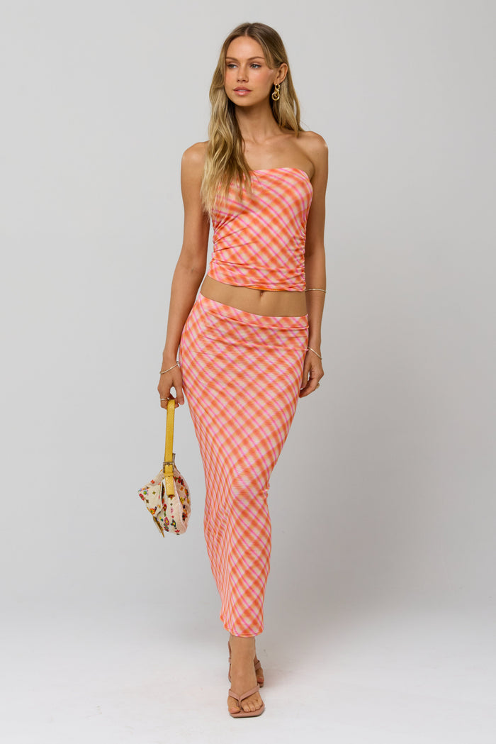 This is an image of Clyde Mesh Skirt in Sorbet - RESA featuring a model wearing the dress