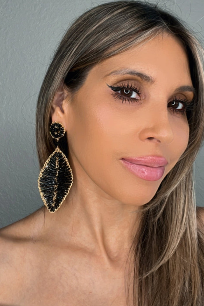 Style the Meticulous Crystal Leaf Statement Earring exclusively at Born To Glam