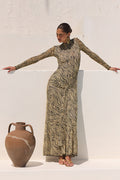 This is an image of Dani Dress in Birch - RESA featuring a model wearing the dress