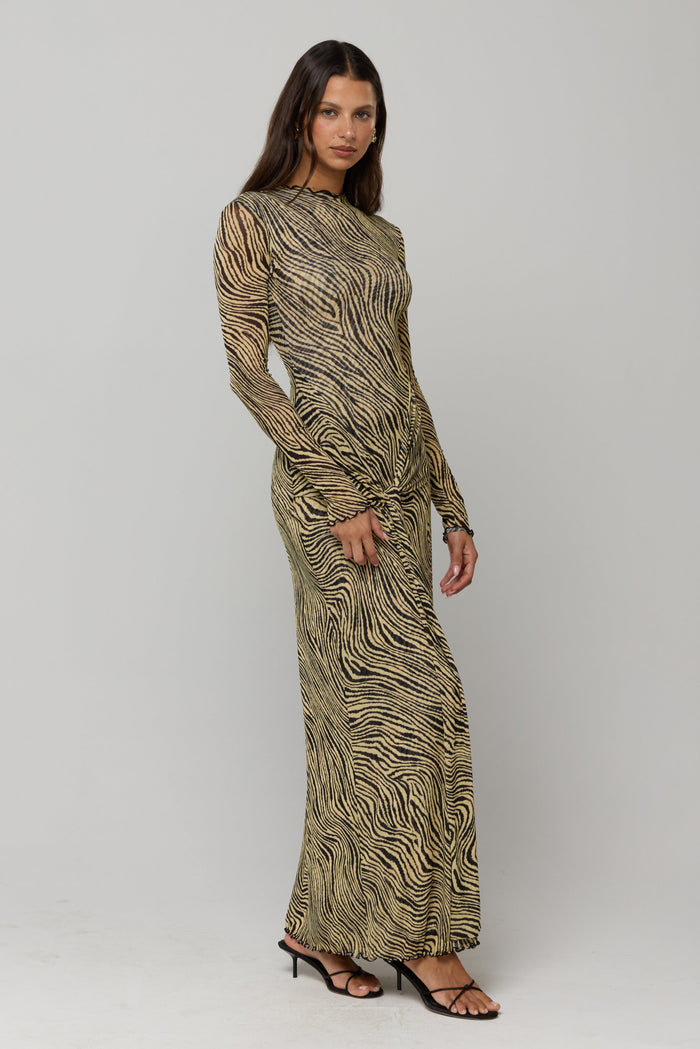 This is an image of Dani Dress in Birch - RESA featuring a model wearing the dress