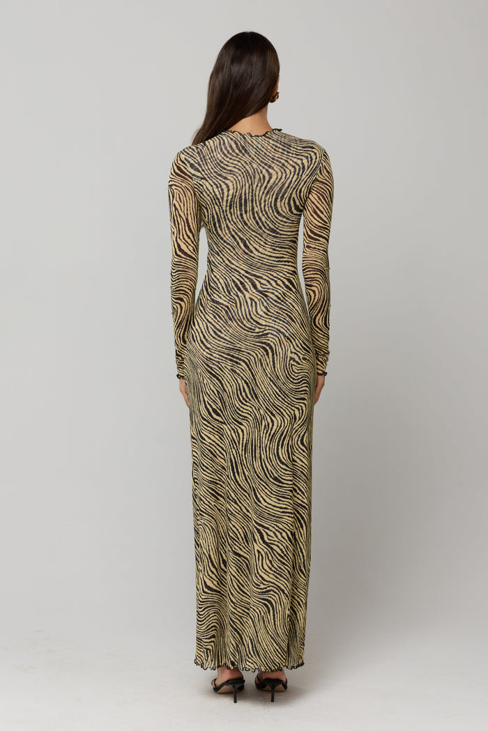 This is an image of Dani Dress in Birch - RESA featuring a model wearing the dress