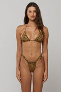 This is an image of Dillan Bikini Bottom in 007 - RESA featuring a model wearing the dress