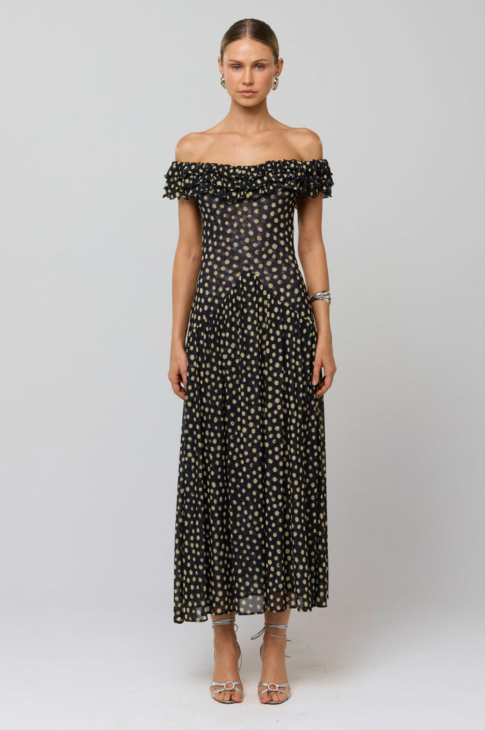This is an image of Dolly Dress in Celeste - RESA featuring a model wearing the dress