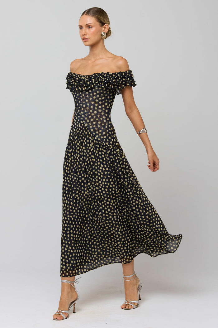 This is an image of Dolly Dress in Celeste - RESA featuring a model wearing the dress