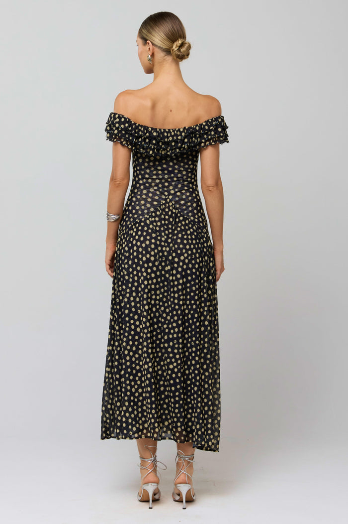 This is an image of Dolly Dress in Celeste - RESA featuring a model wearing the dress