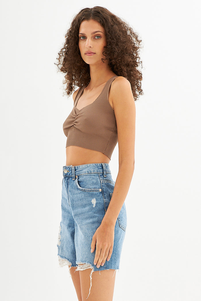 Side view of Erin Ribbed Tank Top in Wild Mushroom brown featuring a gathered chest, cropped fit, and ribbed knit texture.
