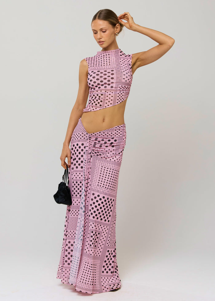 This is an image of Estelle Skirt in Lauper - RESA featuring a model wearing the dress