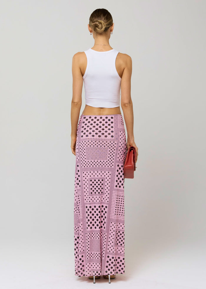This is an image of Estelle Skirt in Lauper - RESA featuring a model wearing the dress