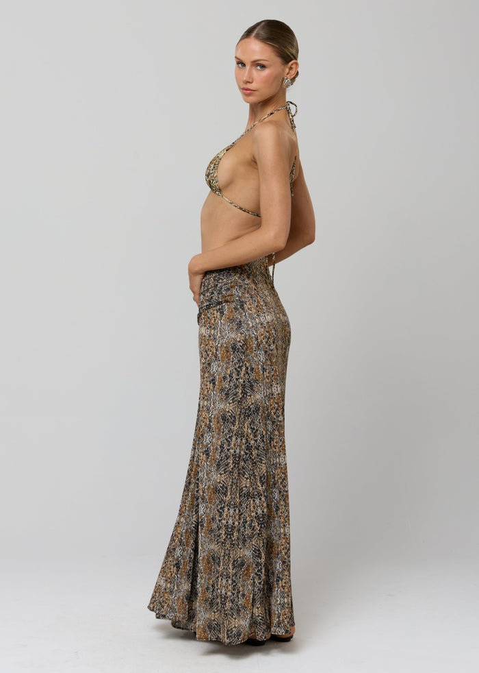 This is an image of Estelle Skirt in Serpent - RESA featuring a model wearing the dress