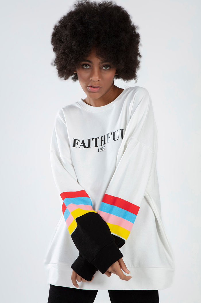 White Faithful 1995 graphic sweatshirt featuring colorful striped sleeves with red, blue, pink, and yellow details.