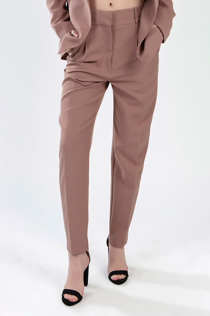 Fiona Pants Set in Wild Mushroom featuring high-waisted tailored trousers with a matching blazer and black heels.