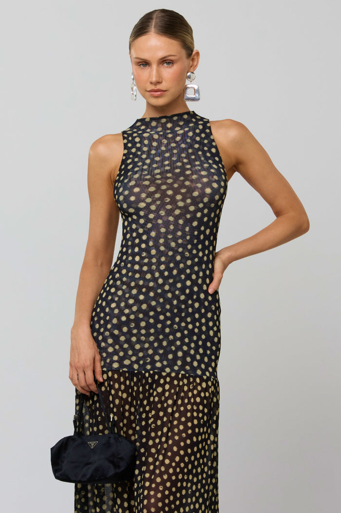 This is an image of Frida Dress in Celeste - RESA featuring a model wearing the dress