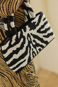 This is an image of Gemma Bag - RESA featuring a model wearing the dress