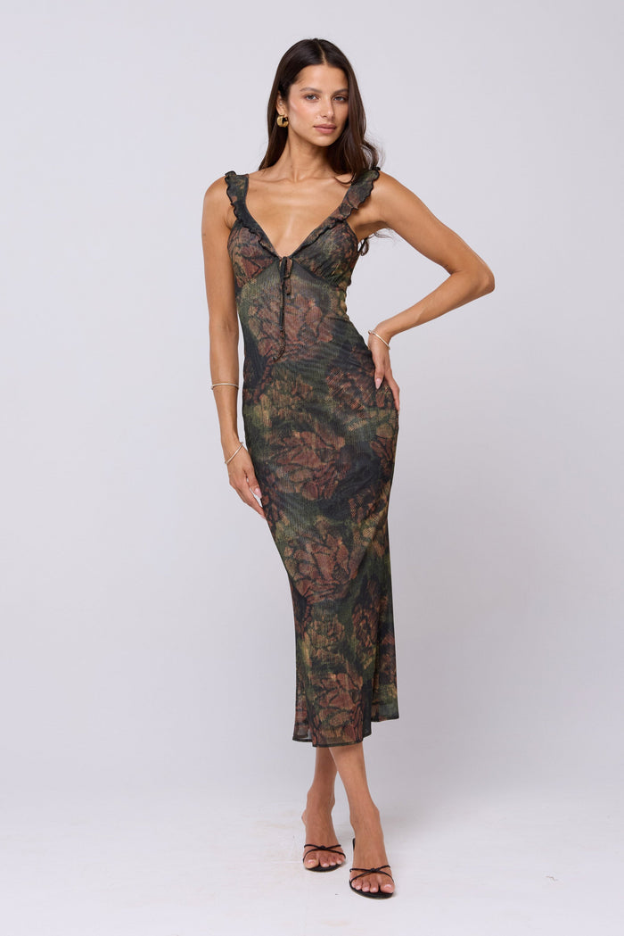 This is an image of Goldie Dress in Autumn - RESA featuring a model wearing the dress