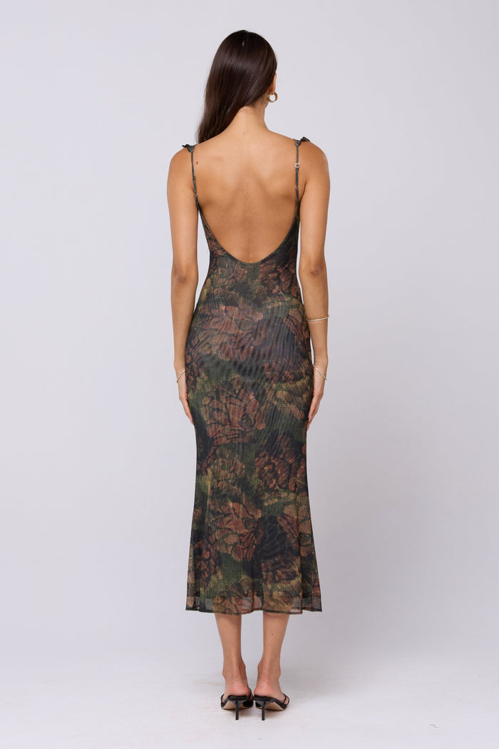 This is an image of Goldie Dress in Autumn - RESA featuring a model wearing the dress