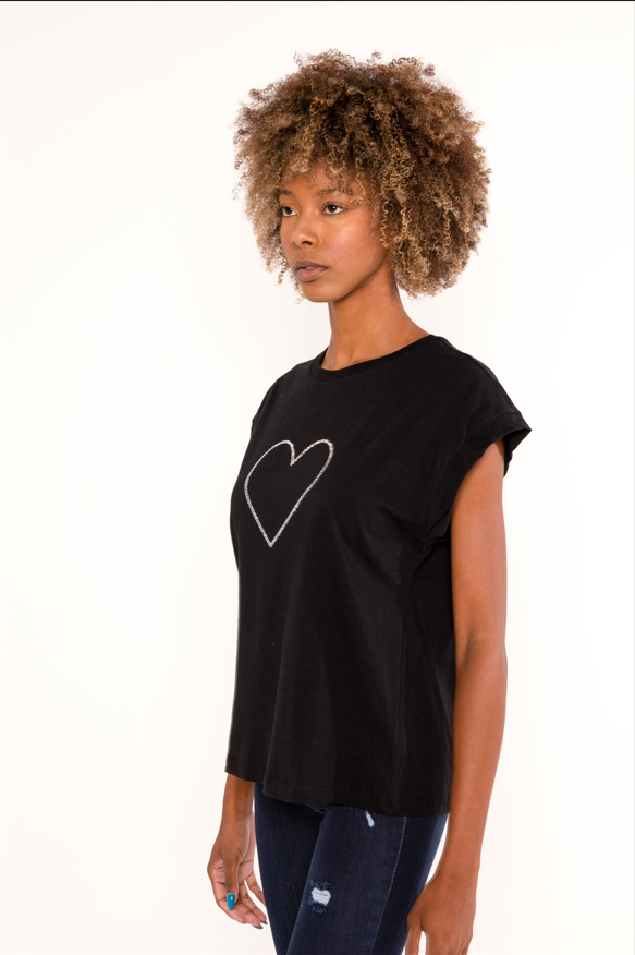 Model wearing a black Heart Top with a white graphic outline, sleeveless crop cut, and crew neck in a side view.