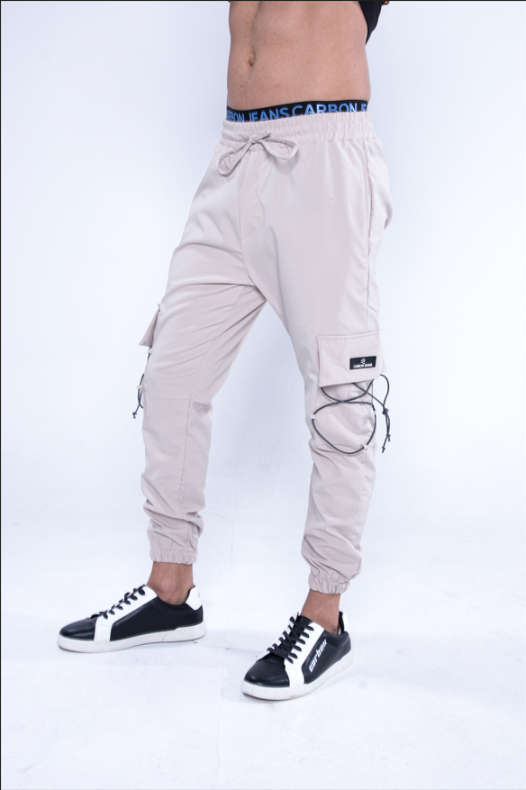 Slim fit khaki Jesus Cargo Pants for men with drawstring waist, utility pockets, and bungee cord detailing.