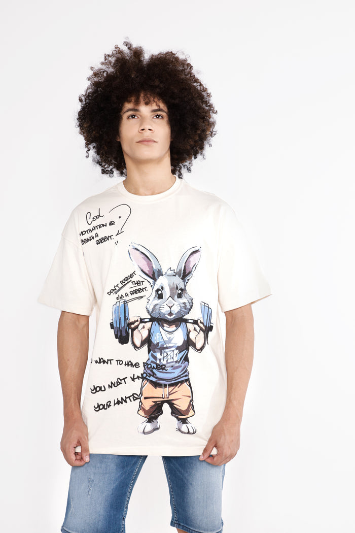 Model wearing blue washed John Denim Shorts with a graphic cream t-shirt against a white background.