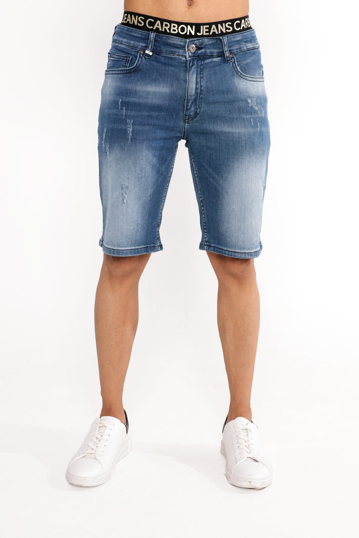 Men’s John Denim Shorts in blue washed distressed fabric with Carbon Jeans branded waistband on white background.