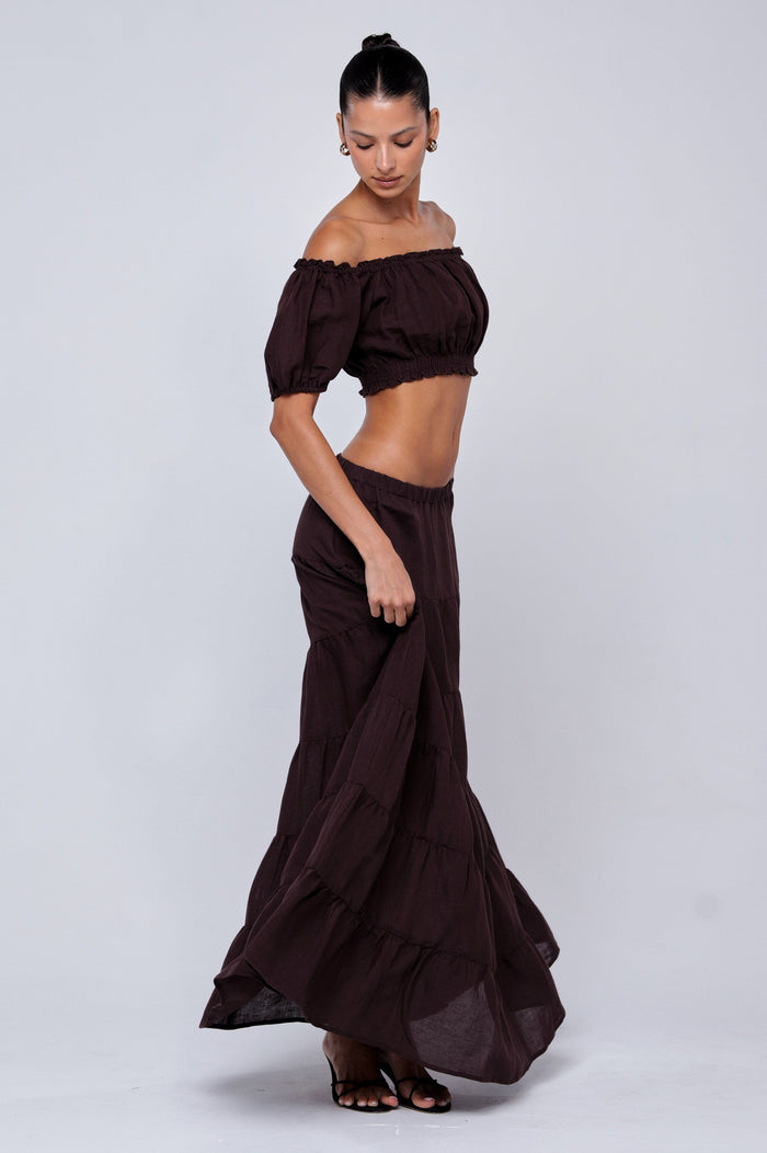 This is an image of Saige Top in Brown Linen - RESA featuring a model wearing the dress