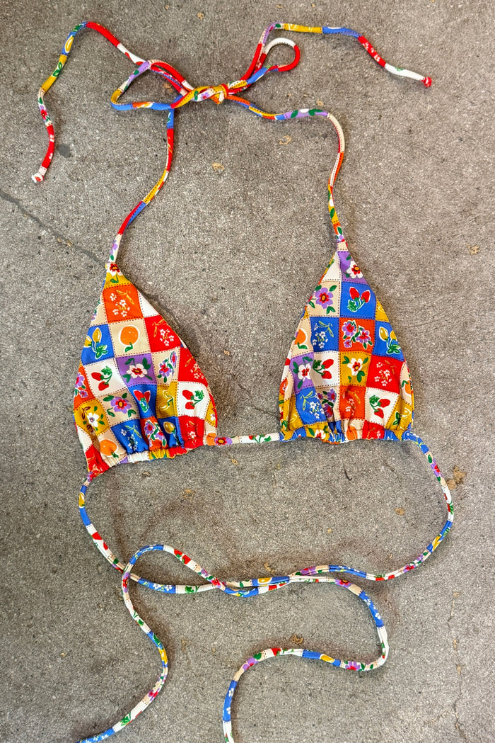 This is an image of Kyle Triangle Bikini Top in Picnic - RESA featuring a model wearing the dress