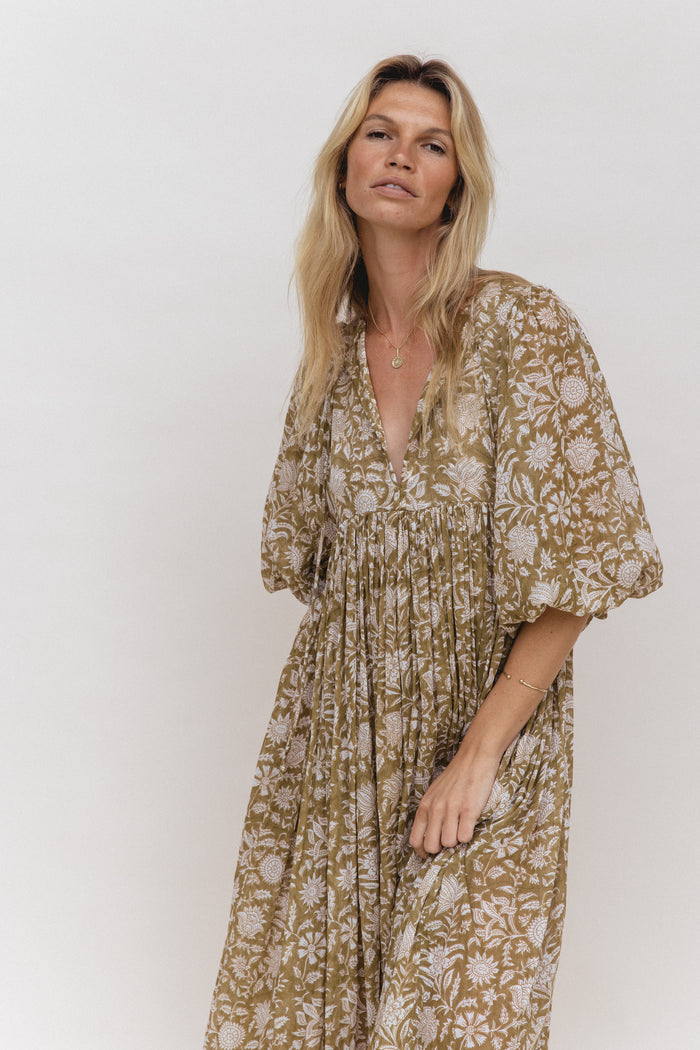 Daughters of India Kyra Maxi Dress in Olive — studio upper body V-neckline and billowed sleeves, gathered waist