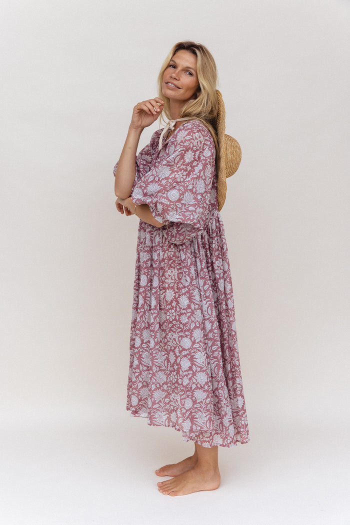 Daughters of India Kyra Midi Dress in Musk — studio with straw hat, side profile, hand screen print cotton