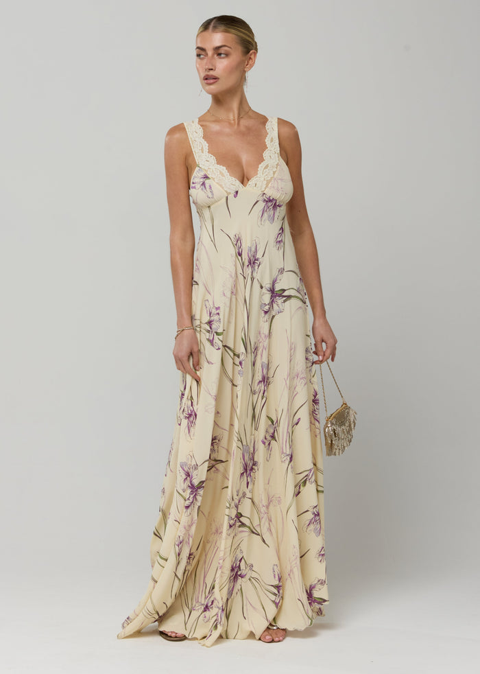 This is an image of Laney Dress in Fern - RESA featuring a model wearing the dress
