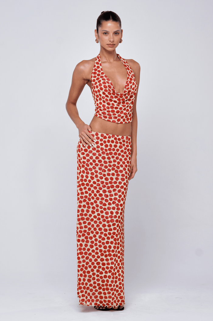 This is an image of Lea Top in Campari - RESA featuring a model wearing the dress