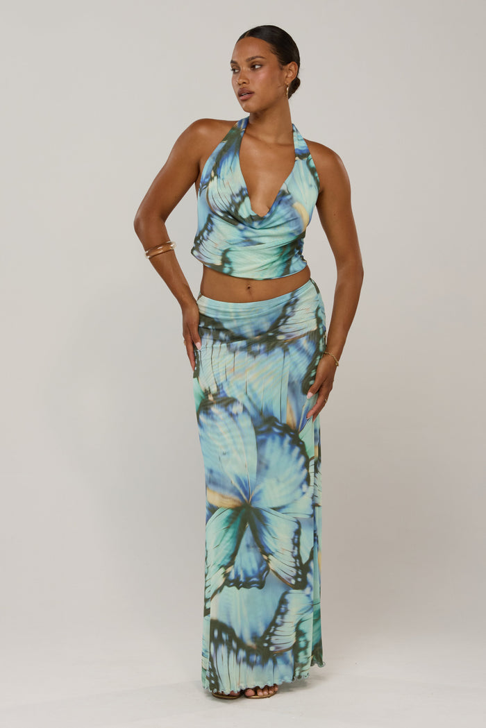 This is an image of Lea in Mariposa - RESA featuring a model wearing the dress