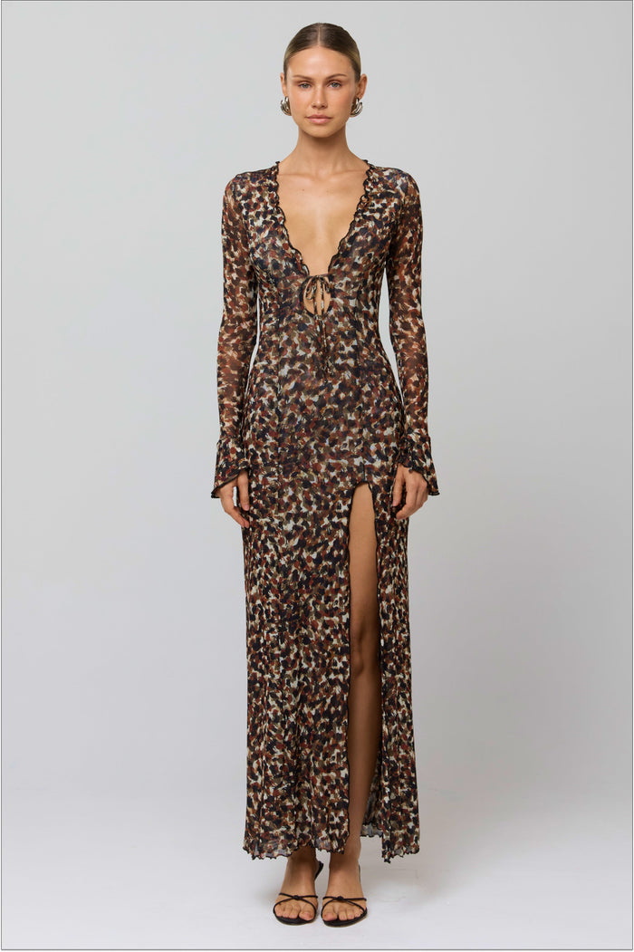 This is an image of Lennon Maxi in Terra - RESA featuring a model wearing the dress