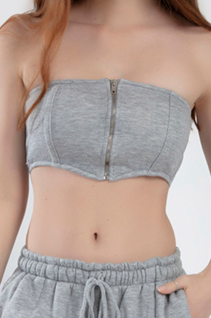 Close-up of Lily Ribbed Top in Light Grey featuring a front zipper and strapless corset style with matching shorts.