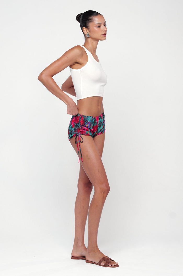 This is an image of Micro Mini short in Resort - RESA featuring a model wearing the dress